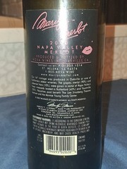 Marilyn Monroe Merlot wine bottle, adorned with beaded bottle cover.