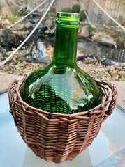 Vintage Emerald Green Glass Demijohn Wine Bottle in Wicker Basket Glass Carboy
