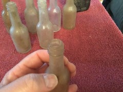 Old Brown 1/2 Pint Bottle and 7 Miniture Bottles