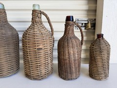 6 Bottles Antique Wicker Wrapped Glass Bottles Lot Handles Tall French Farmhouse
