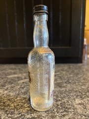 Meier’s Mini 3 Oz Wine Bottle Ohio Sauterne With Paper Label And Embossed Grapes