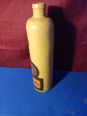 Item # 24 Stoneware Vintage Wine Bottle Pale Yellow