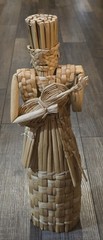 Vintage Wine Bottle Cover Wicker 18” Tiki Statue Playing Instrument