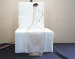 Vintage Garrett&rsquo;s American Wines embossed clear 1 quart wine bottle grapes