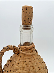 Vintage Rattan Wicker Wrapped Liquor Wine Bottle w/ Handle and Stopper 10&Prime; Empty