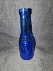 Vintage AM Blue Glass Wine Bottle 5&Prime; Tall Embossed Grapes