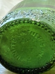 Vgt Green Glass Wine Bottle With Embossed Grape Designs, 11” Tall