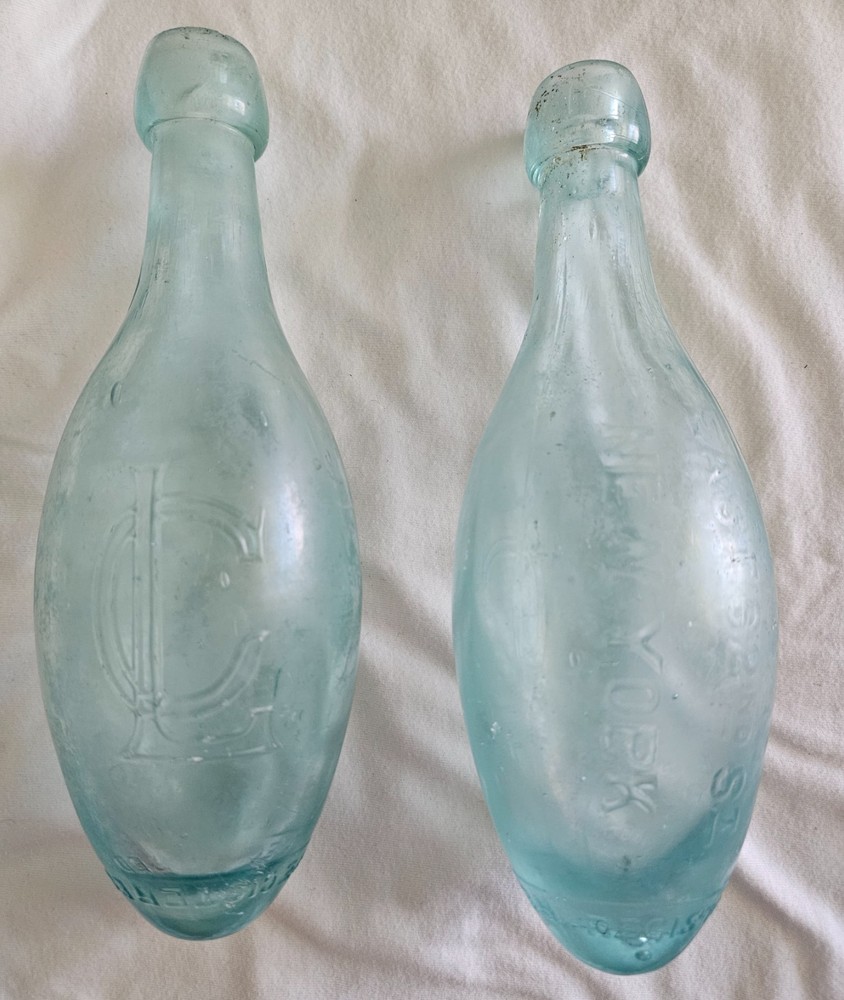 antique torpedo bottles