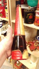 Vintage unusual bottle with leather covering, cool collectible, 11 x 3 inches