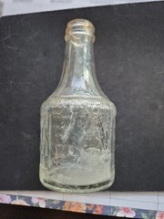 1961 Mogen David Wine Bottle 4 oz with Star of Dvid On Bottle