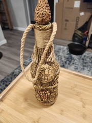 Vintage Moldova Fancy Ceramic Covered Wine Bottle.