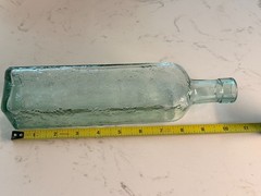 Vintage Tall Bottle. Antique green intricate bottle CANADA