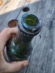 Antique Unbranded Wine Bottle With Iridescent Colored Patina Collectible