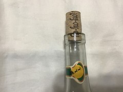 Christmas themed empty Chateau St. Nicholas wine bottle