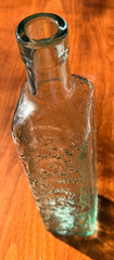 Vintage Tall Bottle. Antique green intricate bottle CANADA