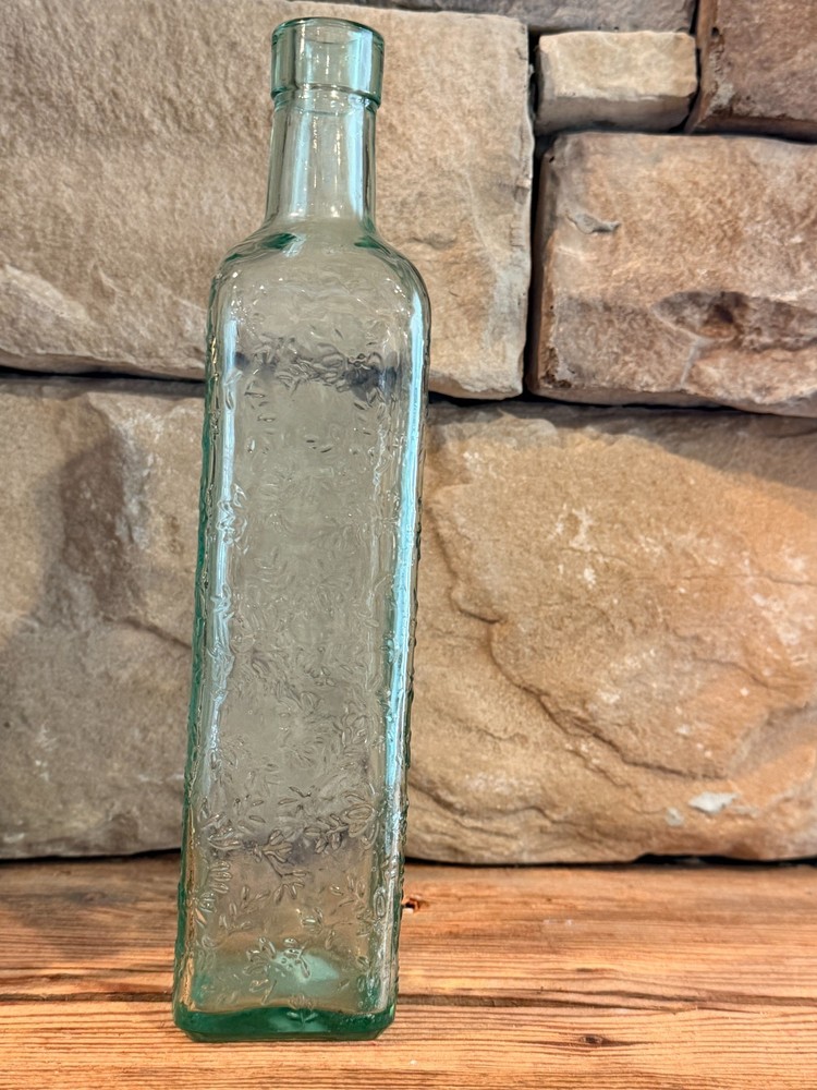 Vintage Tall Bottle. Antique green intricate bottle CANADA