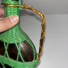 MCM Viresa Plastic Scoubidou Woven Wicker Wine Bottle Jug Metal Handle Green