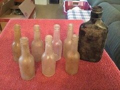Old Brown 1/2 Pint Bottle and 7 Miniture Bottles