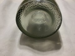 Christmas themed empty Chateau St. Nicholas wine bottle