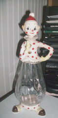 Vintage 1950&rsquo;s clown wine bottle decanter clear glass body ceramic top feet