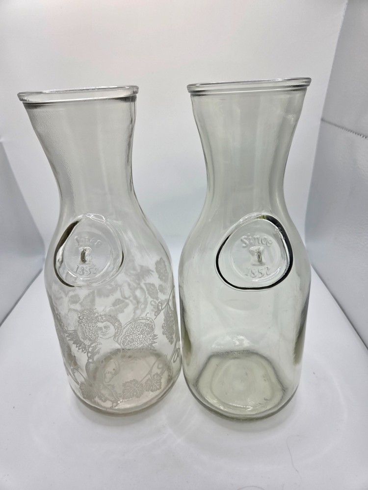 2 Vintage Paul Masson carafes/ 1 etched/1 plain marked since 1852