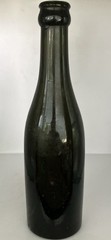 Antique 8 1/4 inch Dark Olive/Green Glass Bottle. O on Bottom. Small chip