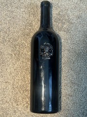 Rare empty bottle of wine The Resurrection (Napa Valley) with a skull