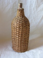 BOTTLE WITH HANDWOVEN WICKER WRAP. DEMIJOHN, 10&Prime;