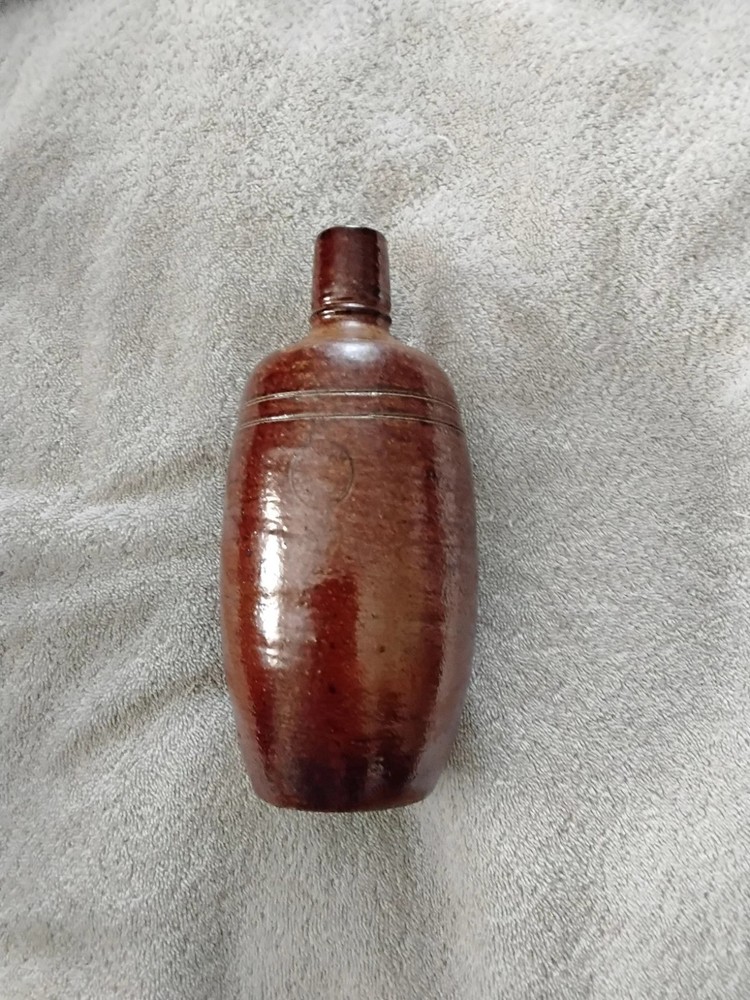 VINTAGE BROWN STONEWARE BOTTLE,PRODUCED IN PORTUGAL BY MAREIA FONSECA PORT WINE,