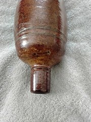 VINTAGE BROWN STONEWARE BOTTLE,PRODUCED IN PORTUGAL BY MAREIA FONSECA PORT WINE,
