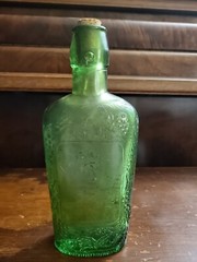 Vintage Liquor wine bottle made in Spain 1994 grapes and leaves embossed SAG