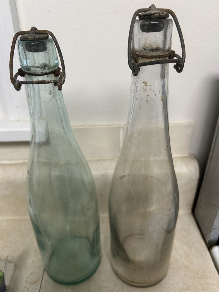 2 Vintage Hand Blown Wine Bottles With Stoppers