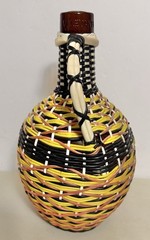 V Levante- Viresa Wine Bottle With Woven Scoubidou Wicker 11” Tall