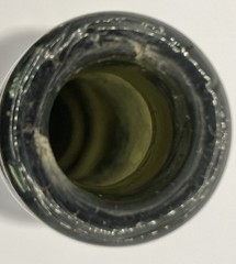 Antique 8 1/4 inch Dark Olive/Green Glass Bottle. O on Bottom. Small chip