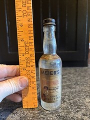 Meier’s Mini 3 Oz Wine Bottle Ohio Sauterne With Paper Label And Embossed Grapes
