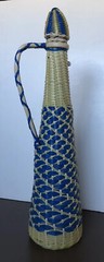 Vintage 1970s blue & natural Wicker Rattan Covered Handled brown Bottle w/ Top