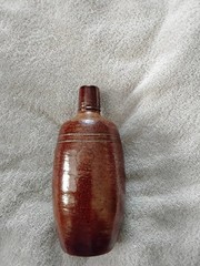 VINTAGE BROWN STONEWARE BOTTLE,PRODUCED IN PORTUGAL BY MAREIA FONSECA PORT WINE,