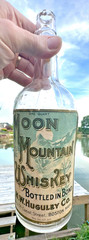 RARE ANTIQUE ORIGINAL  » MOON MOUNTAIN WHISKEY  » PAPER LABEL EMPTY BOTTLE ! NICE