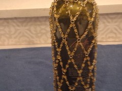Marilyn Monroe Merlot wine bottle, adorned with beaded bottle cover.