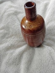 VINTAGE BROWN STONEWARE BOTTLE,PRODUCED IN PORTUGAL BY MAREIA FONSECA PORT WINE,