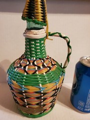 Vintage Plastic Wicker Wrapped Glass Bottle Decanter Woven Spanish Burgundy 1959