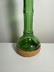 Vintage Glass, Long Neck, Green Bottle With Wickard Base 10 Inches Tall. Nice