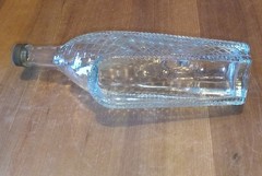 London White Dinner Wine Bottle Basket Weave sides fill w/ marbles colored sand