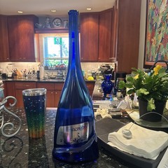 Empty Colbalt blue Incanto Wine bottle
