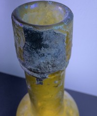 Antique *YELLOW* iridescent glass wine bottle, long neck, 12 oz.