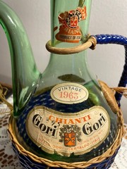1963 Chianti Italian Wine Green Glass Decanter & Blue Wicker Basket w/labels.