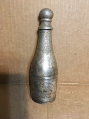 Used. Approx 7” Silver Plated by Parks Cuvée Speciale Premier Champagne Bottle