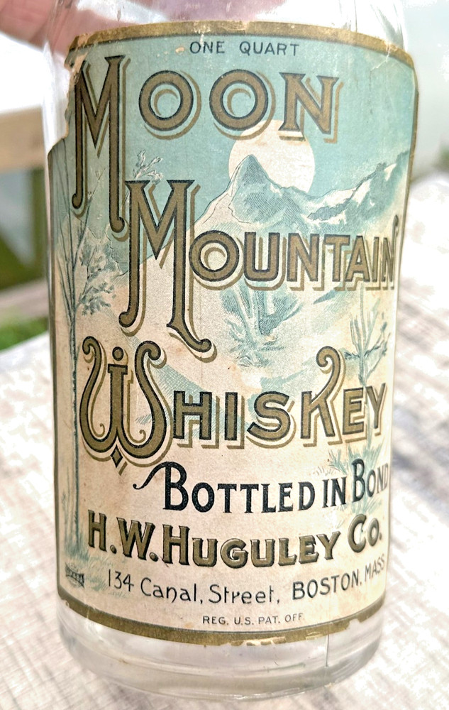 RARE ANTIQUE ORIGINAL  » MOON MOUNTAIN WHISKEY  » PAPER LABEL EMPTY BOTTLE ! NICE