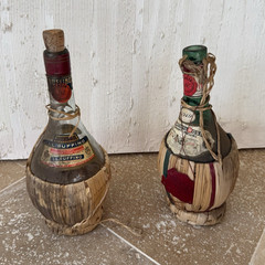 Lot of 2 Wine Glass Bottles in Wicker Straw Baskets w/ Cork Stoppers