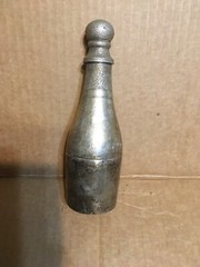 Used. Approx 7” Silver Plated by Parks Cuvée Speciale Premier Champagne Bottle